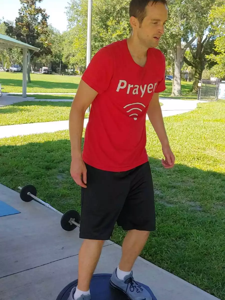 Jerry working out outside in a park